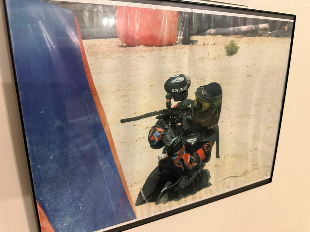 Rodger Thomas holding paintball equipment